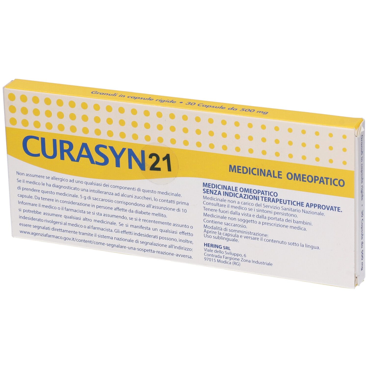 Scatola con coperchio giallo. Scritto "CURASYN 21". Testo: "Granuli in capsule rigide - 30 Capsule da 500 mg".