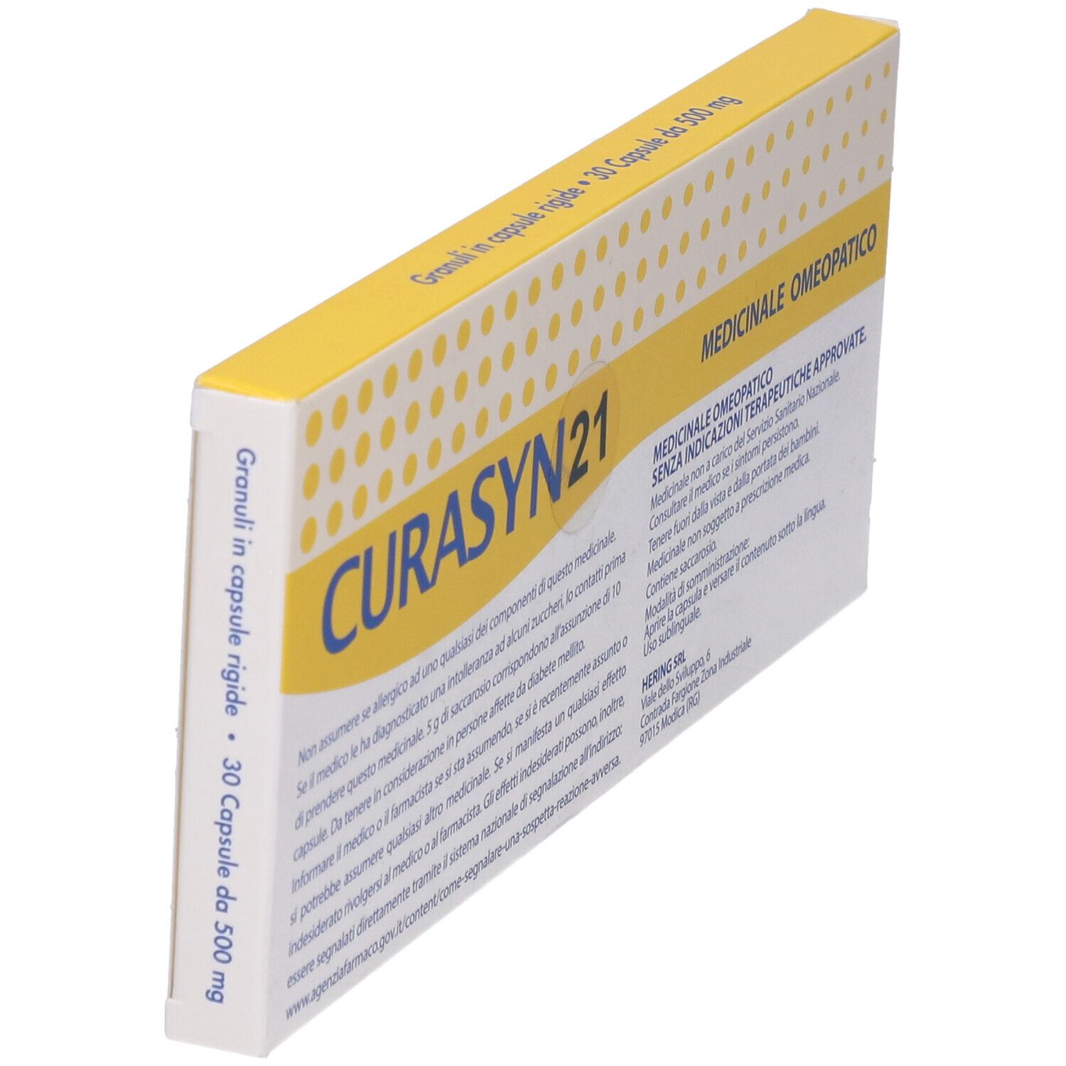 Scatola con coperchio giallo. Scritto "CURASYN 21". Testo: "Granuli in capsule rigide - 30 Capsule da 500 mg".
