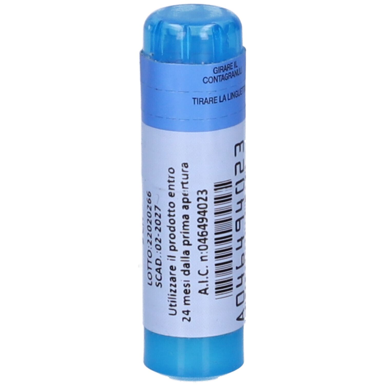 Contenitore cilindrico blu con etichetta bianca. Scritta: ACIDUM NITRICUM 9 CH. Numero A.I.C. Istruzioni per l'uso.