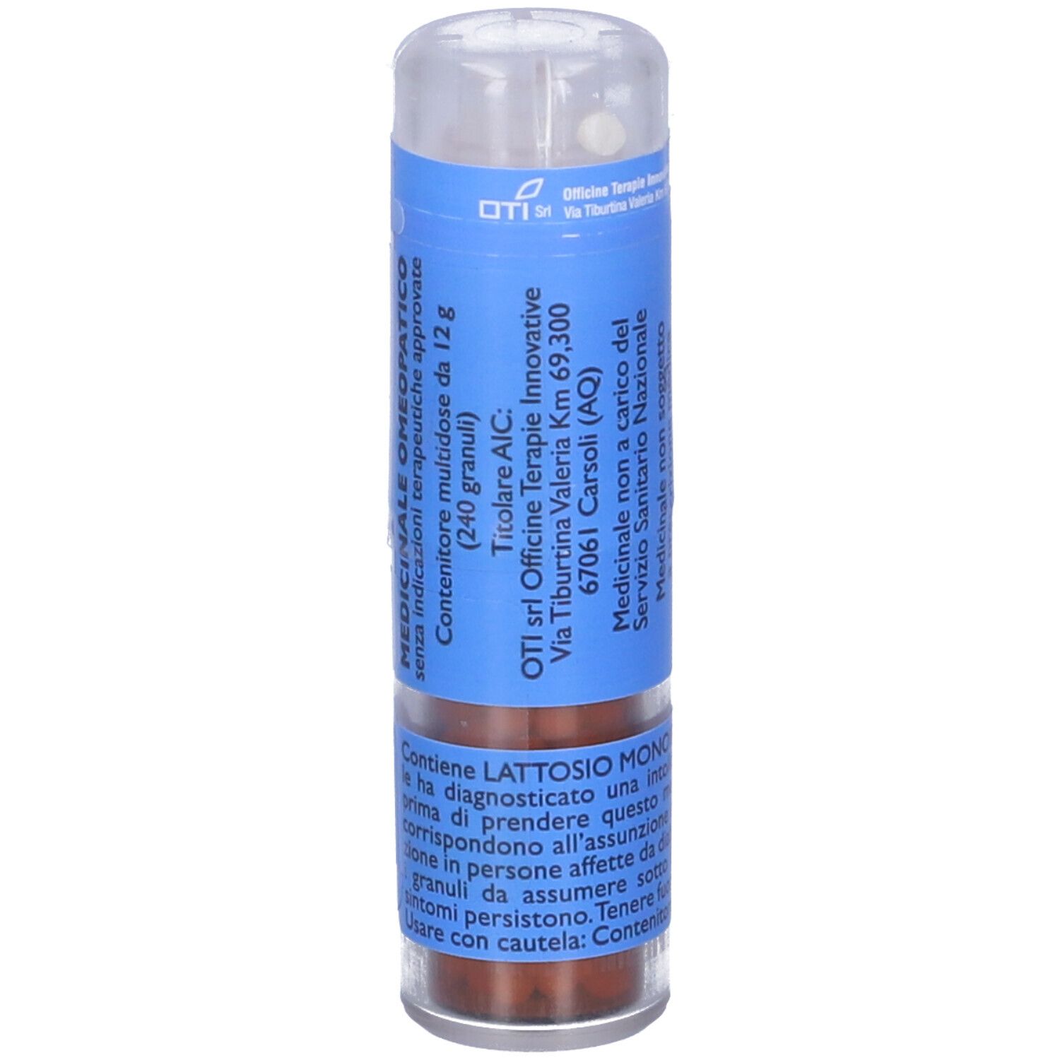 Contenitore cilindrico con etichetta blu e testo. Coperchio trasparente. Contiene granuli. 12 g.