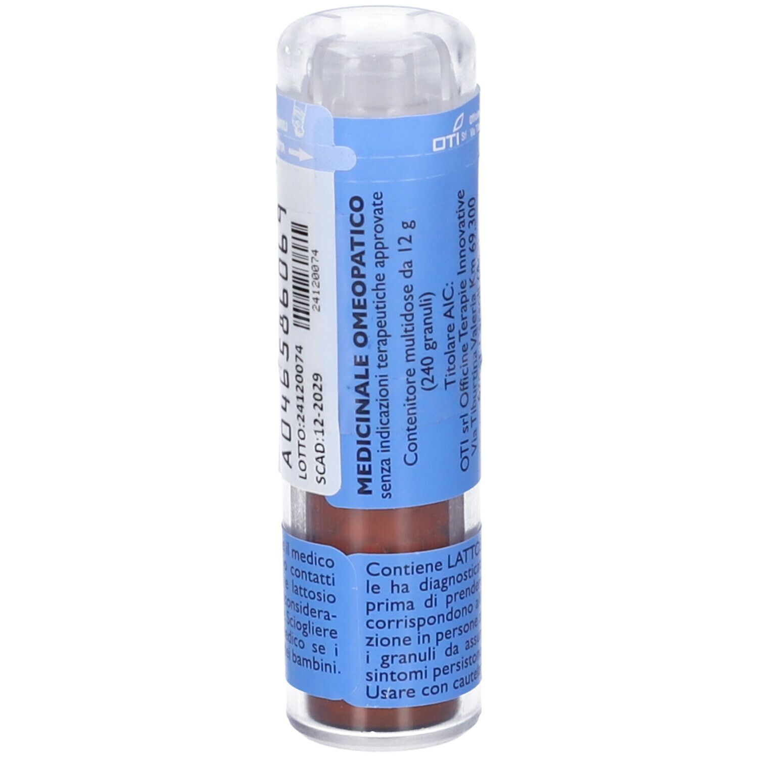Confezione cilindrica blu. Contiene granuli. Coperchio trasparente. Testo: Medicinale Omeopatico.