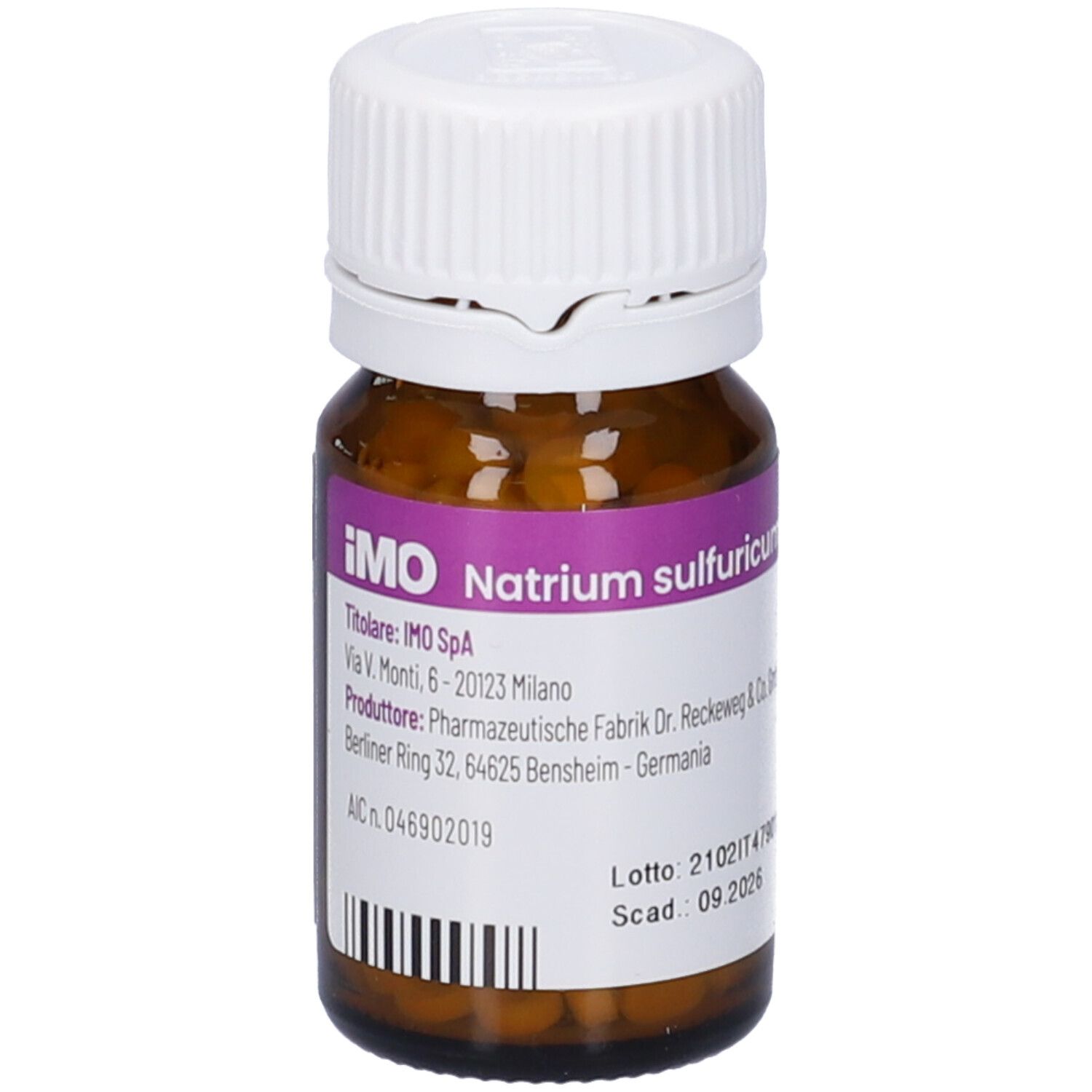 Flacone di vetro marrone con tappo bianco. Etichetta con nome e informazioni. Codice a barre in basso.