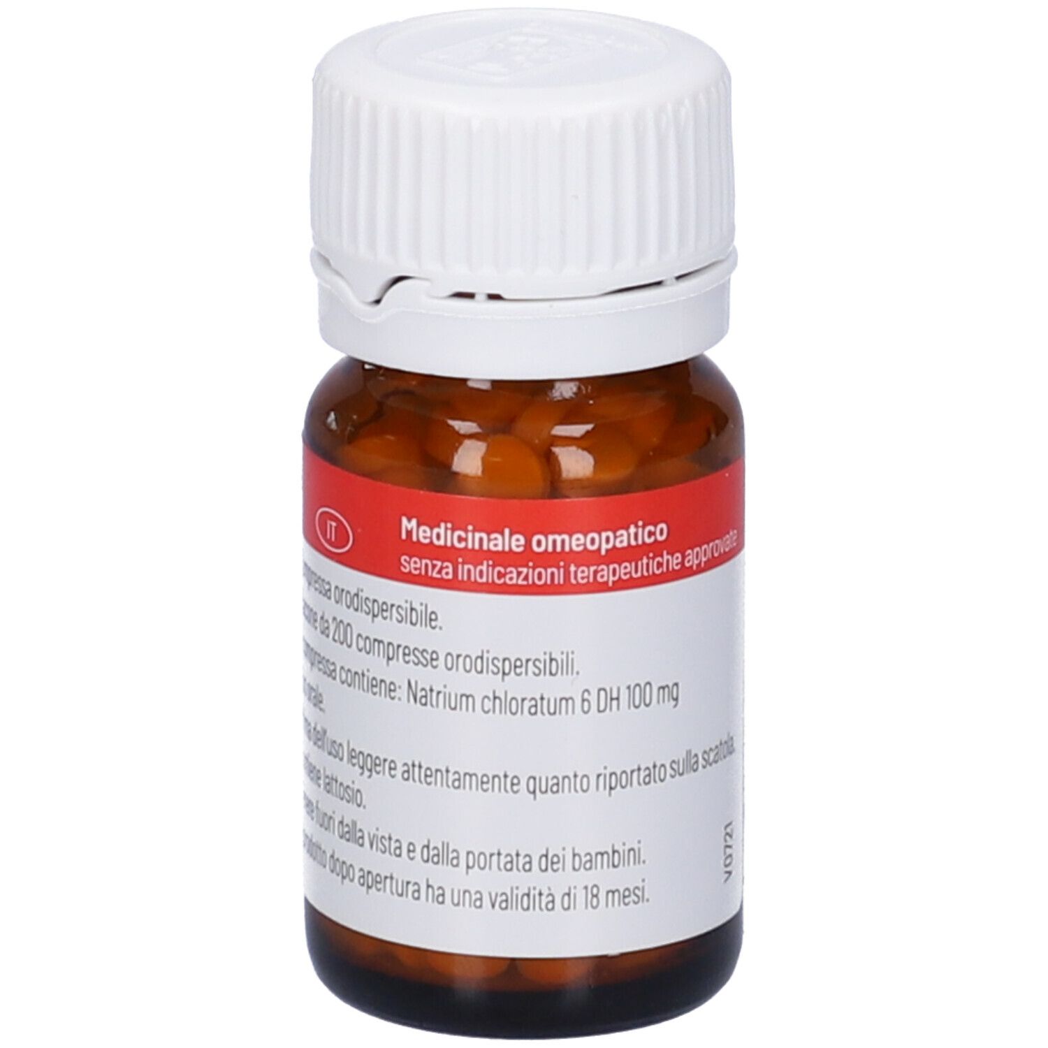 Flacone di vetro marrone con tappo bianco. Etichetta con informazioni sul prodotto. Compresse all'interno visibili. Codice a barre.