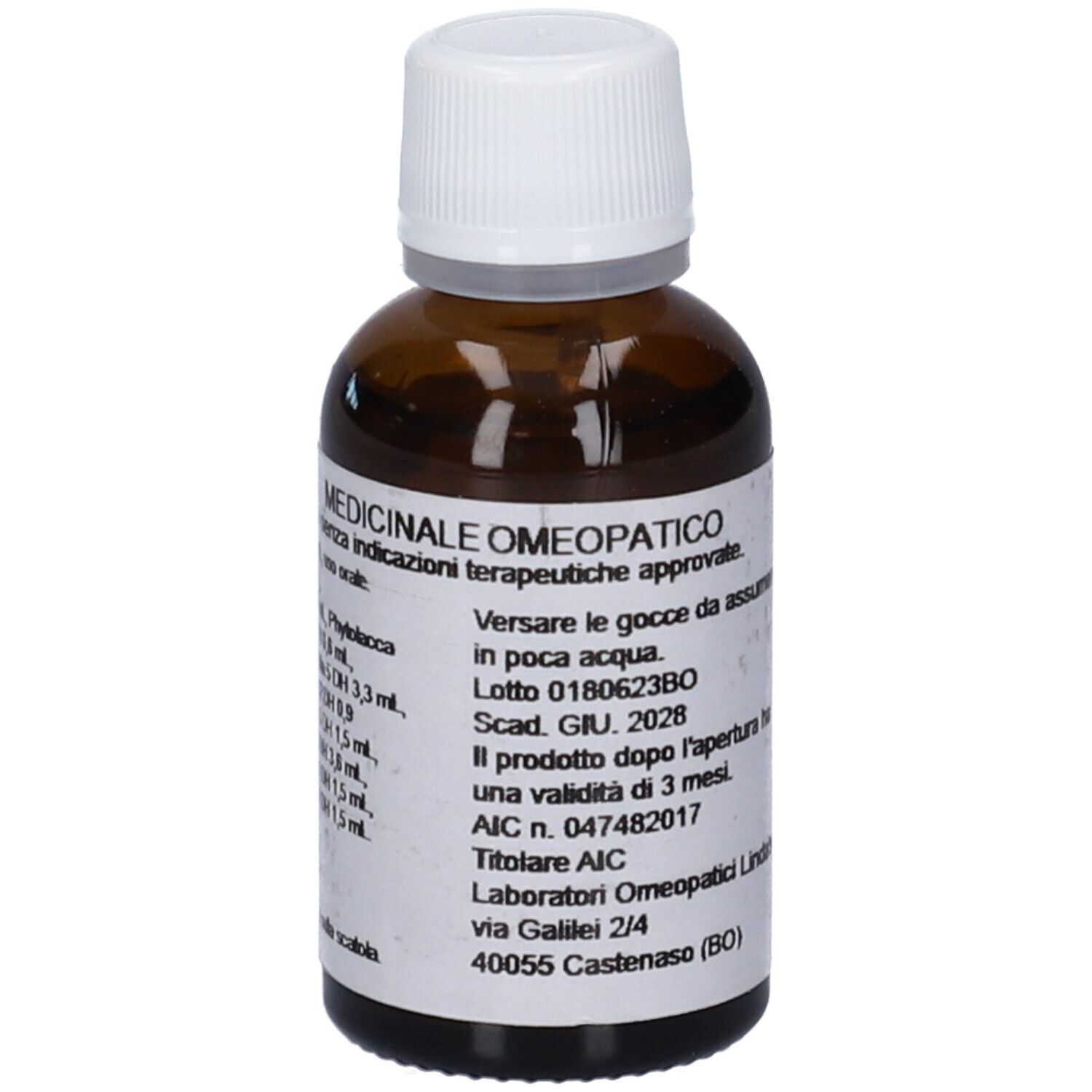 Flacone di vetro marrone con tappo bianco. Etichetta con informazioni sul prodotto. Medicinale omeopatico.