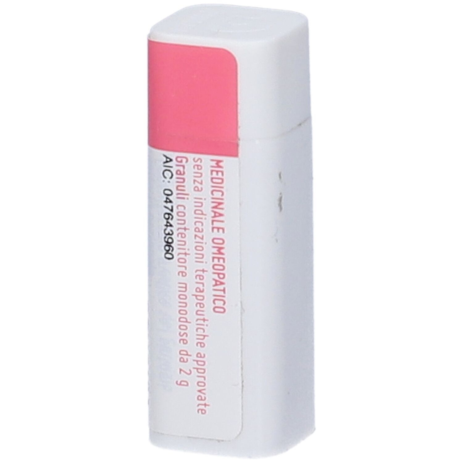 Contenitore cilindrico bianco con etichetta rosa. Scritta: Prodotto medico, Granuli.