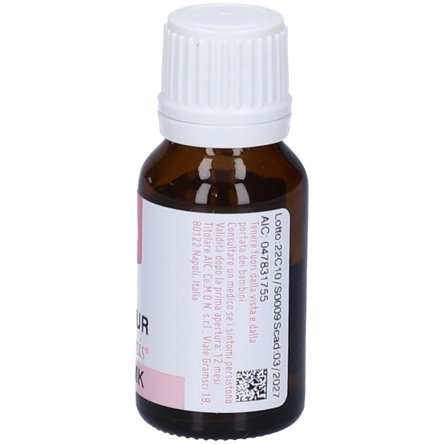 Flacone di vetro marrone con tappo bianco. Etichetta con numero di lotto, scadenza e altre informazioni.