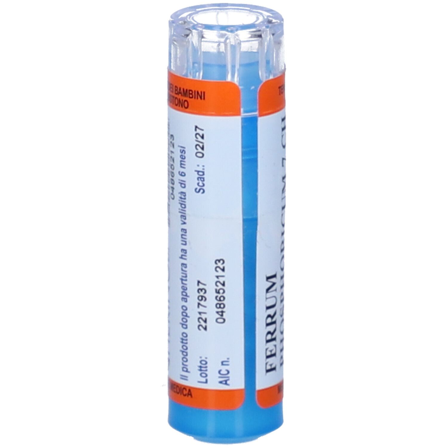 Confezione multidose cilindrica blu e bianca. Scritta: FERRUM. Etichetta con numero di lotto, data di scadenza e altre informazioni.