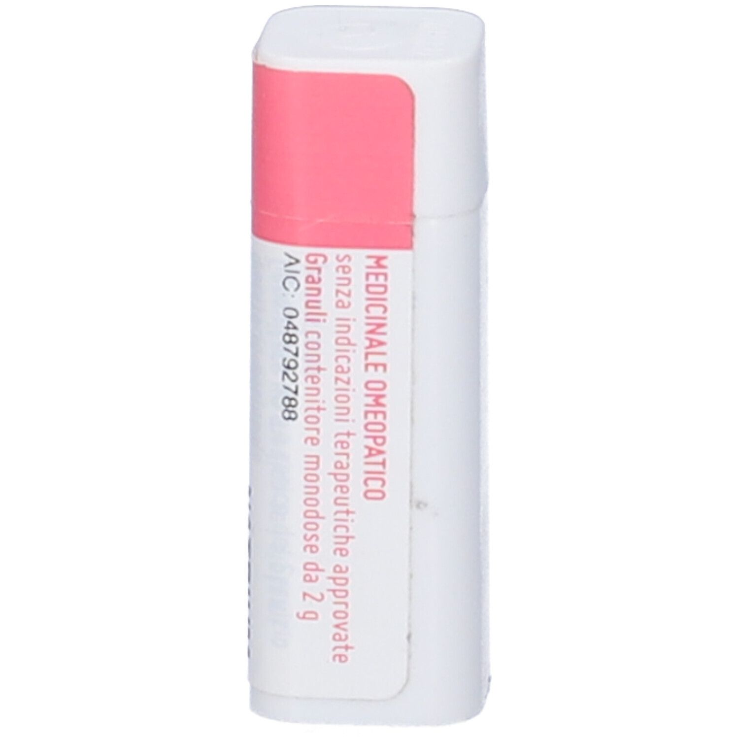 Contenitore cilindrico con etichetta rosa e bianca. Testo: Medicinale omeopatico, Granuli, AIC.