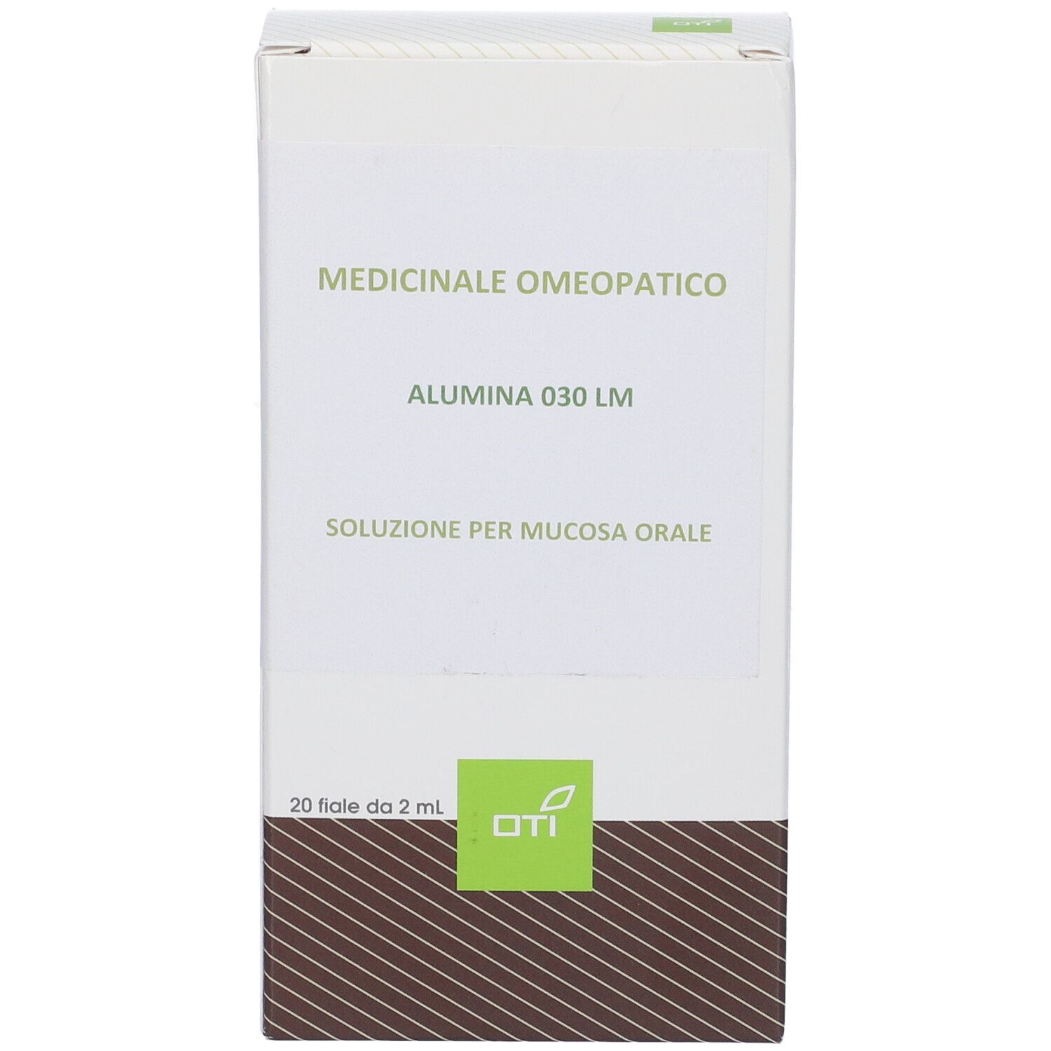 Scatola bianca con dettagli verdi. Scritto: Medicinale Omeopatico, Alumina 030 LM, Soluzione per mucosa orale. Logo OTI.