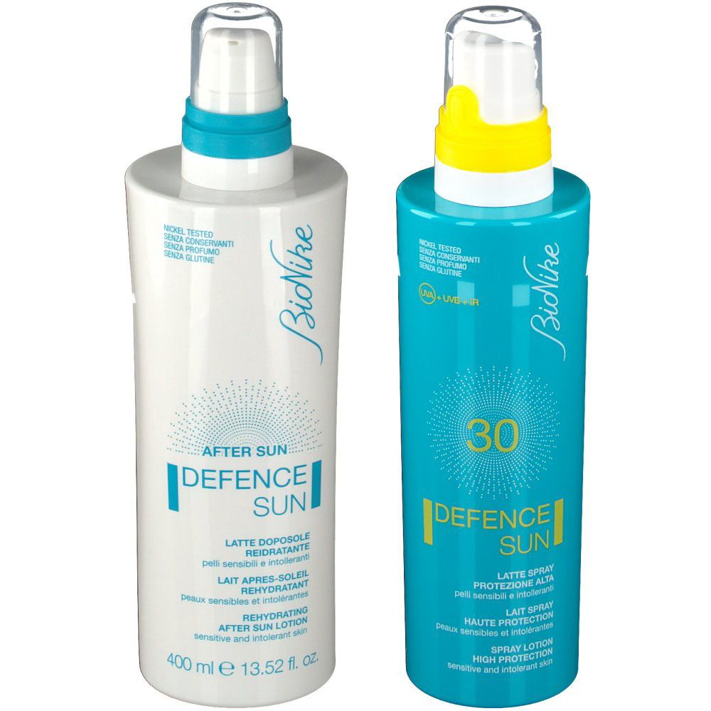 Due flaconi di protezione solare BioNike. A sinistra, lozione doposole, a destra, spray solare SPF 30. Con erogatore.