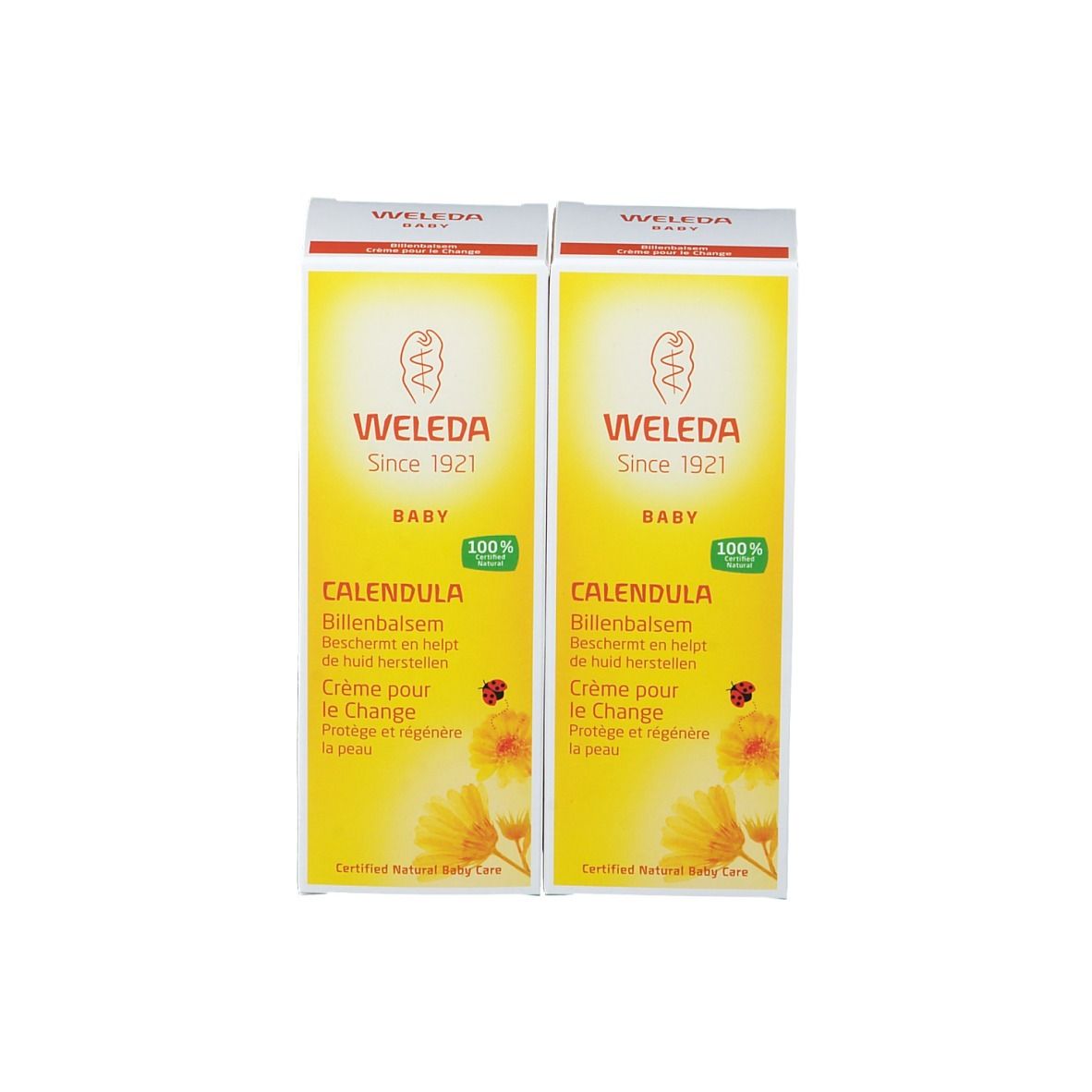 Due scatole di crema. Scritta: WELEDA, BABY, Calendula, Crème pour le Change. Con sigillo 100%.