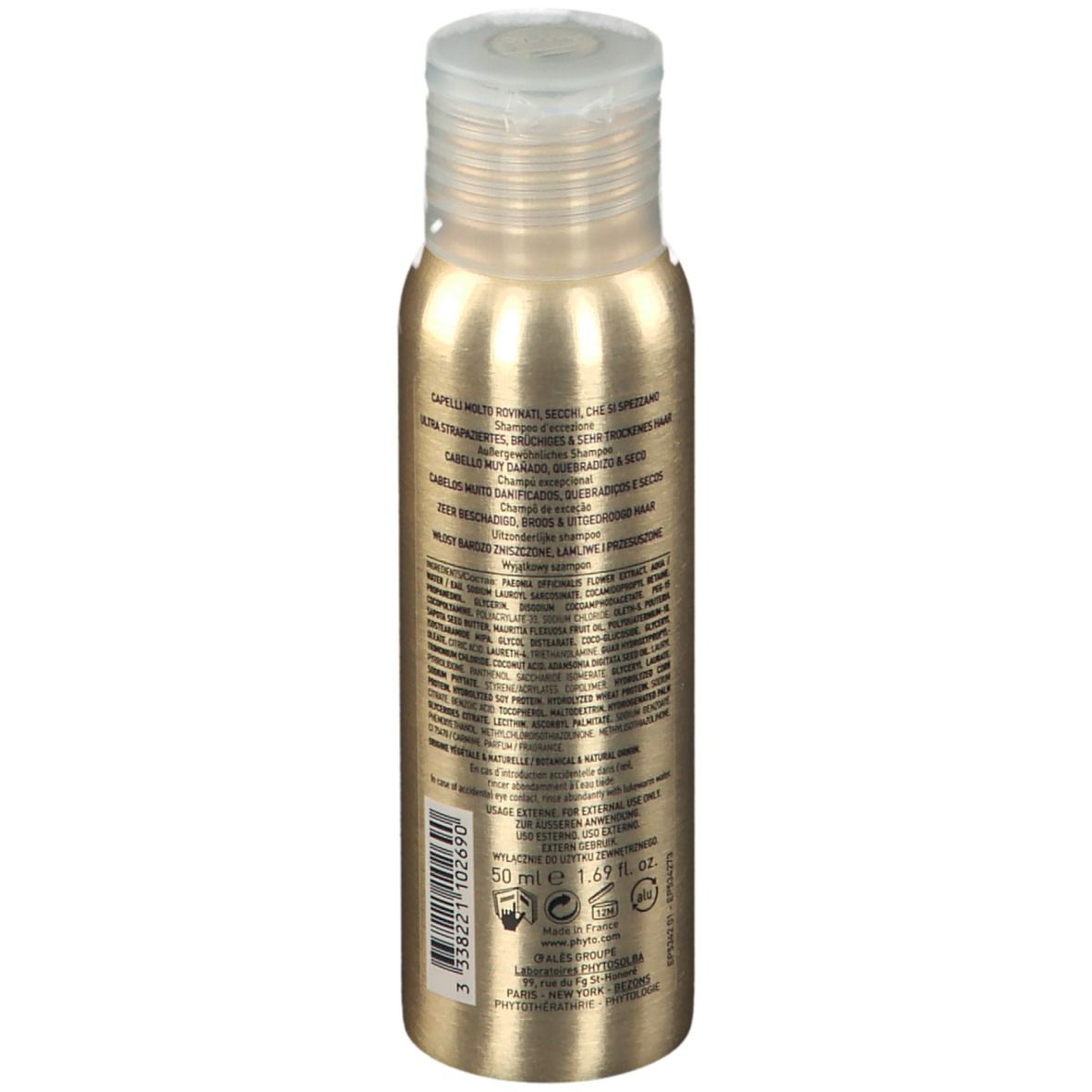 Retro di un flacone dorato con tappo bianco. Testo multilingue, inclusi ingredienti e informazioni del produttore.