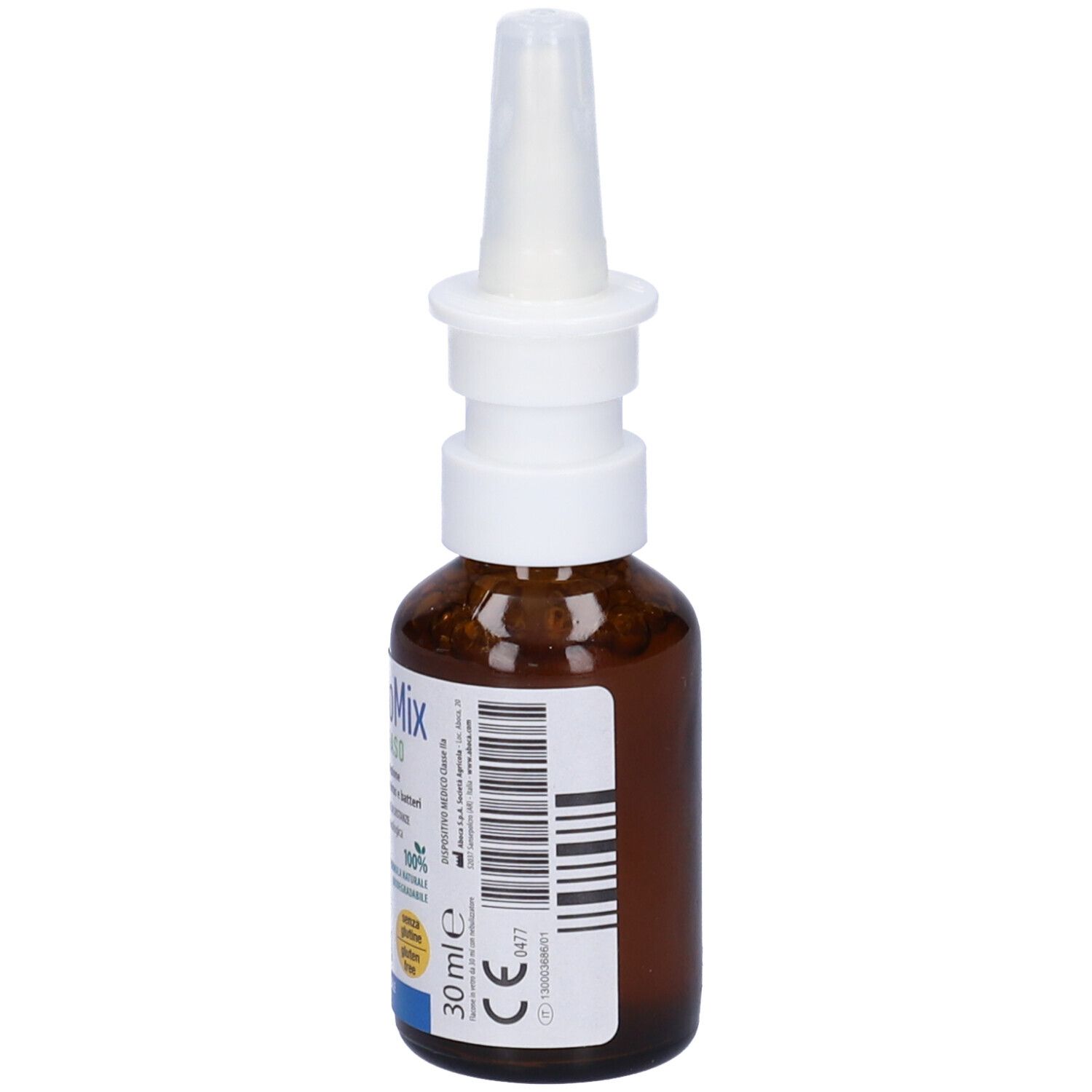 Flacone di vetro marrone con erogatore bianco. Etichetta con codice a barre e marchio CE. 30 ml.