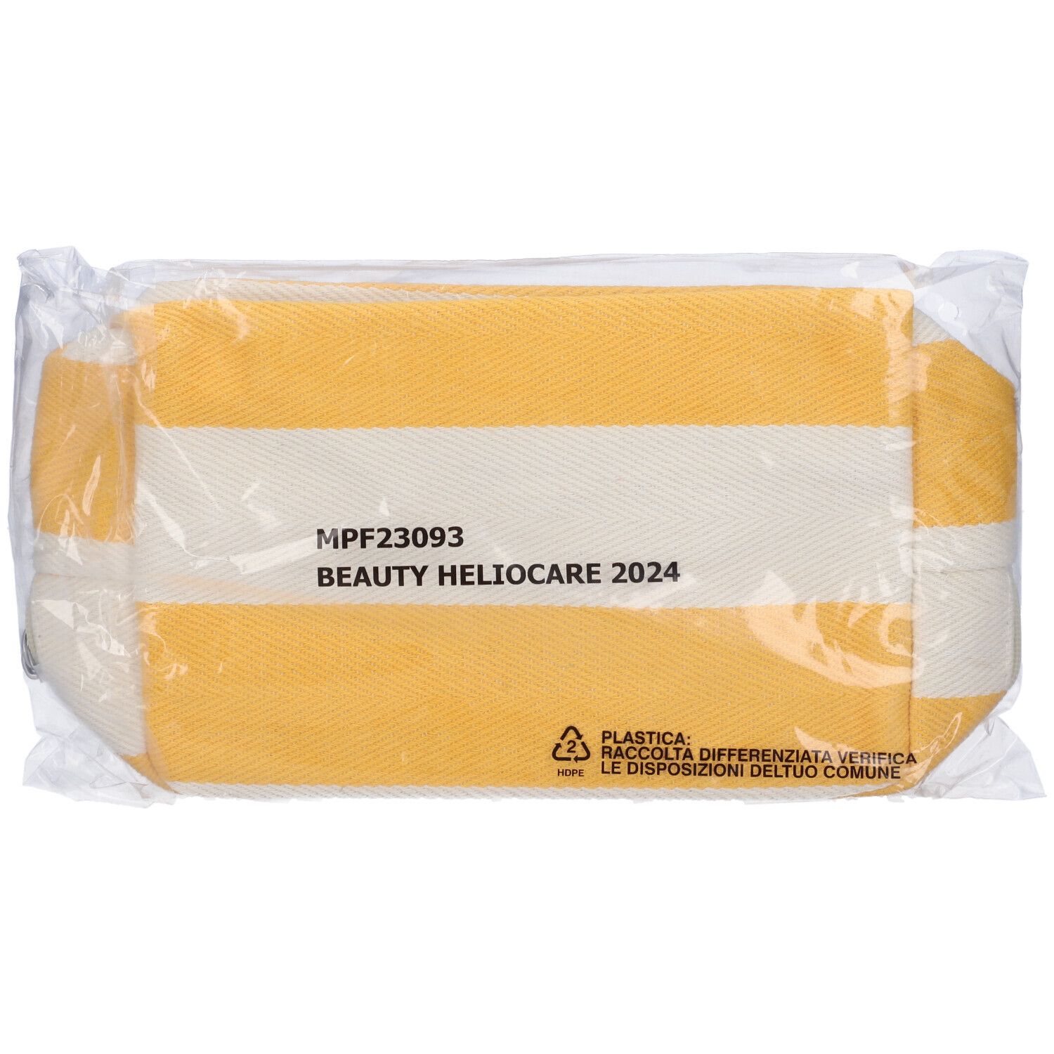 Beauty case a righe gialle e bianche in confezione di plastica. Scritta: Beauty Heliocare 2024. Simbolo di riciclaggio.