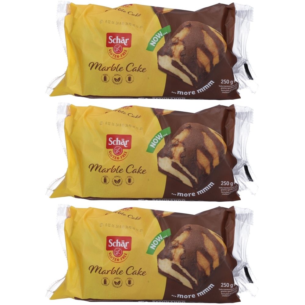 Tre confezioni di Schär Marble Cake. Confezione gialla e marrone con nome del prodotto e logo senza glutine. Torte singole visibili.