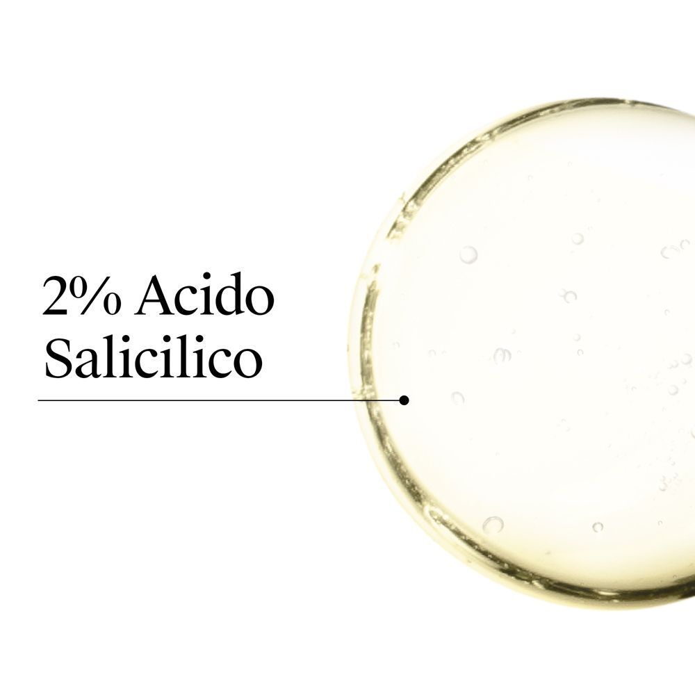 Goccia di shampoo con scritta '2% Acido Salicilico'.