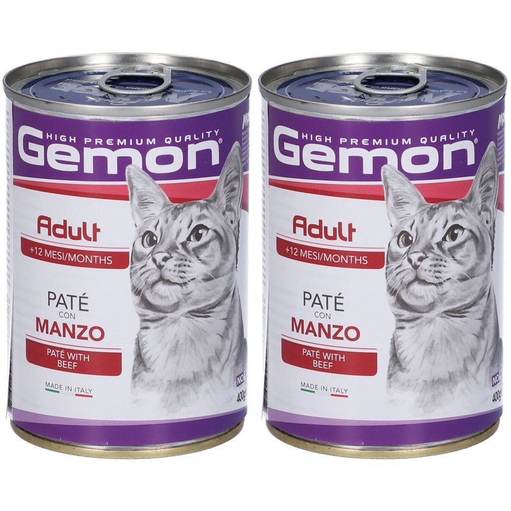 Due lattine di cibo per gatti. Scritta: Gemon, Adult, Paté con Manzo. Immagine di un gatto. Prodotto in Italia.
