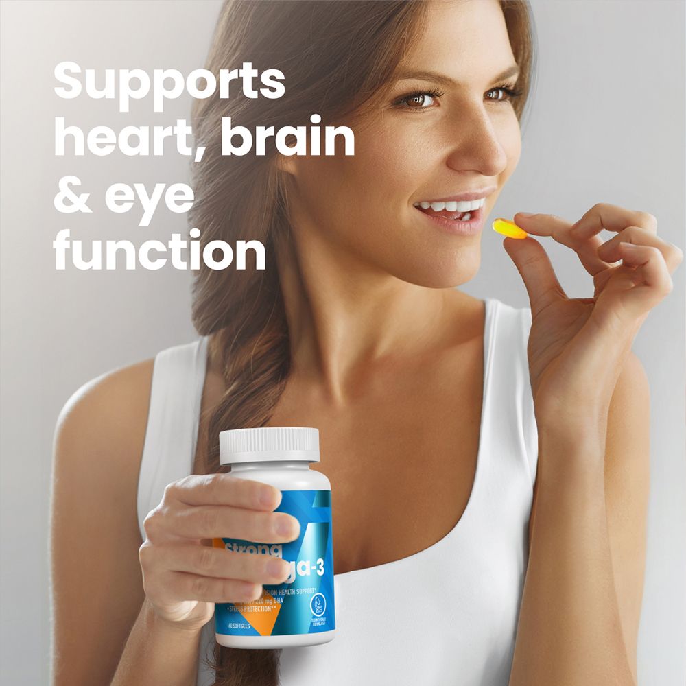 Donna tiene una capsula VPLAB Strong Omega-3. Supporta la funzione cardiaca, cerebrale e oculare. La donna sorride.