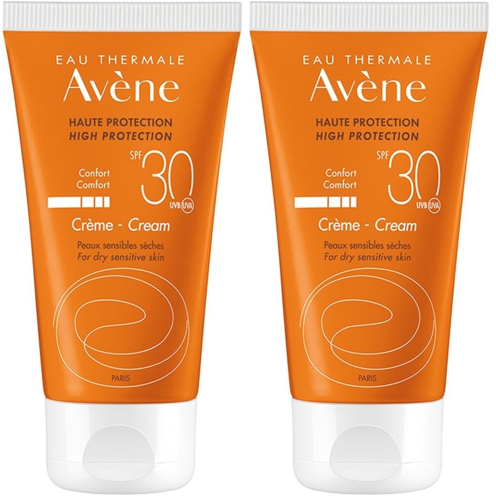 Due tubi di crema solare arancioni con tappo bianco. Testo: Avène, SPF 30, Crème - Cream.
