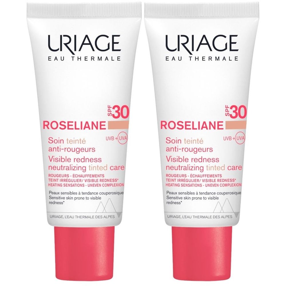 Due tubi di crema Roséliane CC. Bianco con accenti rosa. Testo: URIAGE, SPF30, Roséliane, anti-rossori.