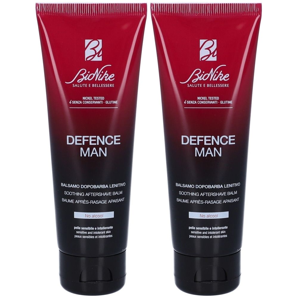 Due tubi di balsamo dopobarba. Tubi sfumati rosso e nero con testo bianco. Marchio: Bionike Defence Man.