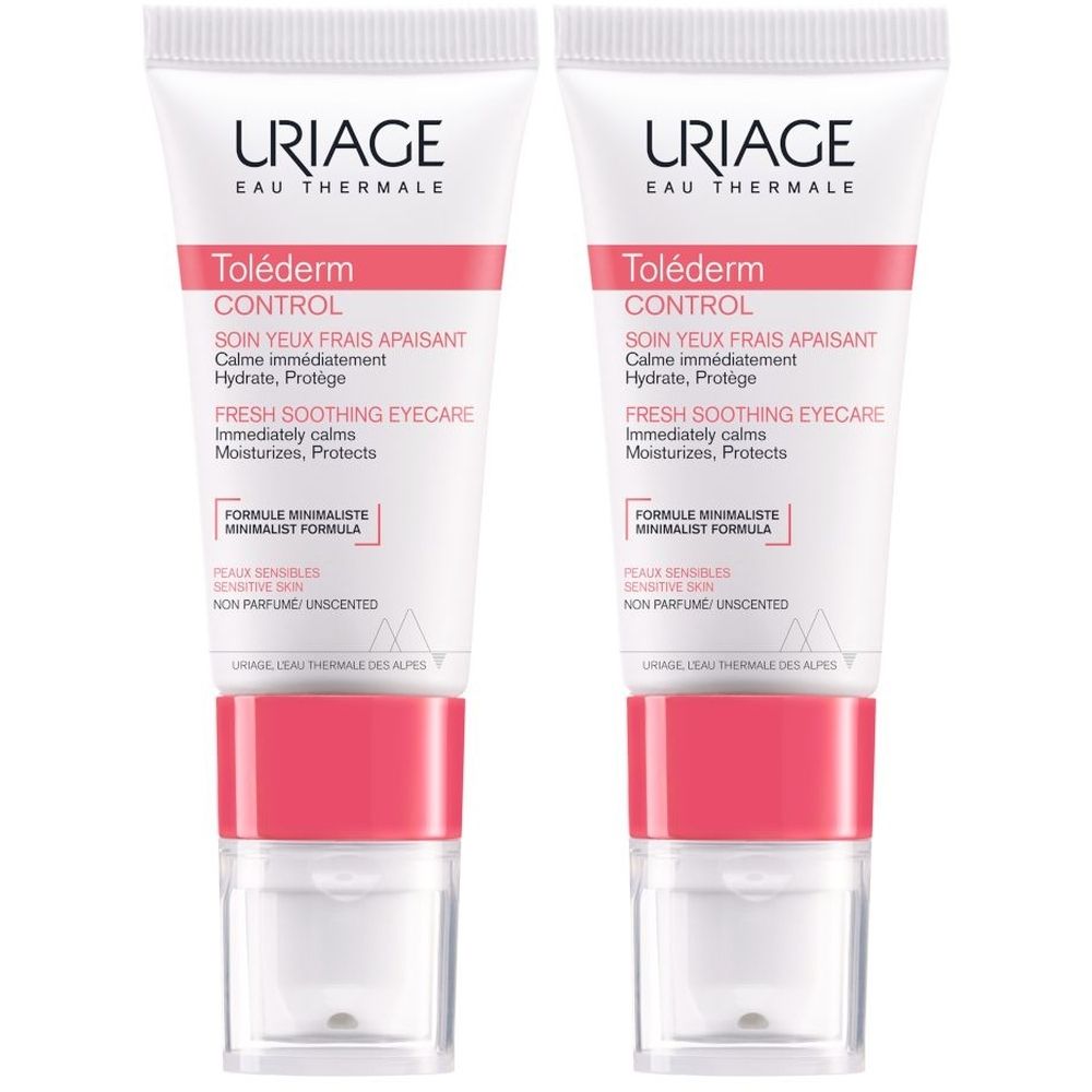 Due tubi di trattamento occhi. Bianchi, con dettagli rosa e applicatore trasparente. Scritta: URIAGE, Toléderm Control.