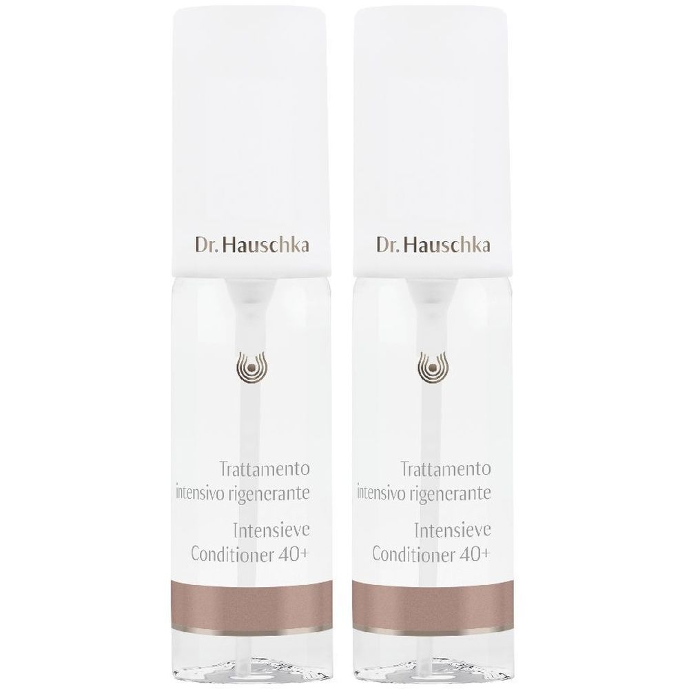 Due flaconi con tappi bianchi e corpo trasparente. Scritta: Dr. Hauschka, Trattamento intensivo rigenerante, Intensieve Conditioner 40+.