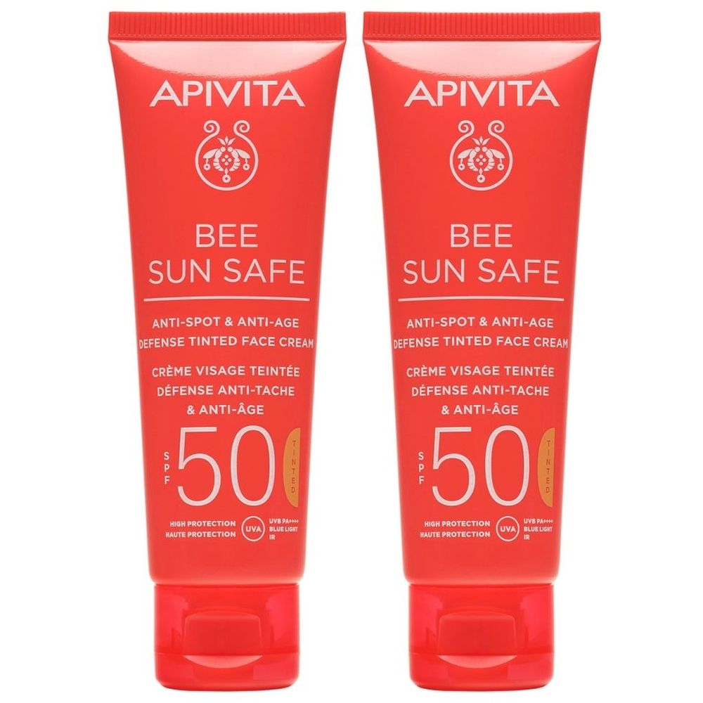 Due tubi di crema solare. Tubi rossi con testo bianco. Scritta: APIVITA, BEE SUN SAFE, Anti-età, SPF 50.