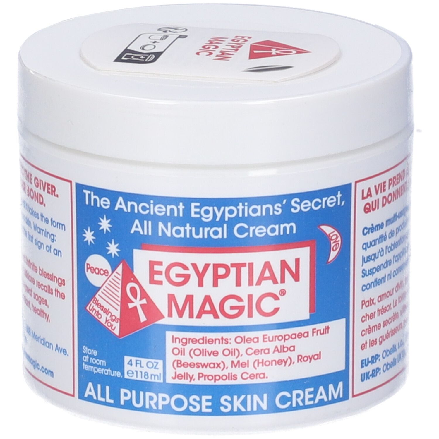 Vasetto bianco con coperchio. Scritta: Egyptian Magic, All Purpose Skin Cream. Stampa rossa e blu. Elenco ingredienti.