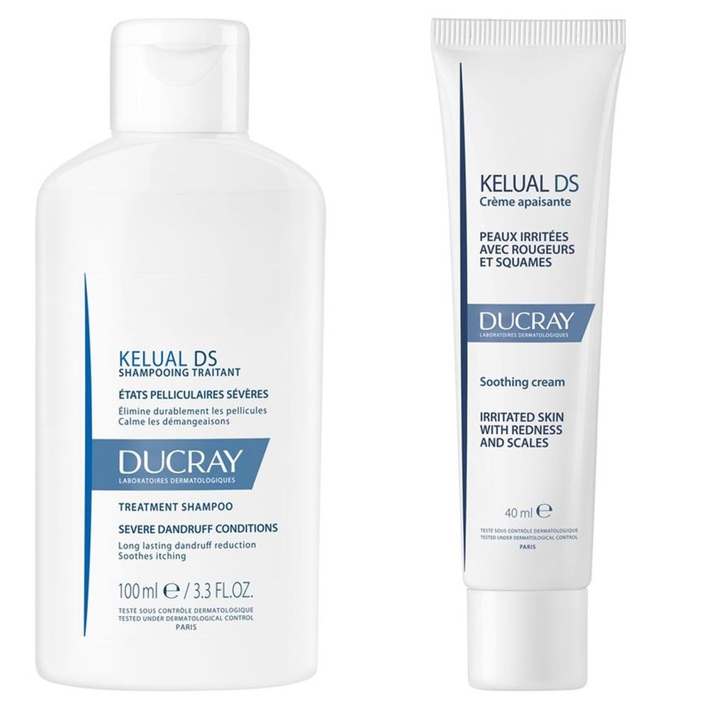 Due tubi bianchi. A sinistra: shampoo, scritta KELUAL DS. A destra: crema, scritta KELUAL DS. Entrambi con accenti blu.