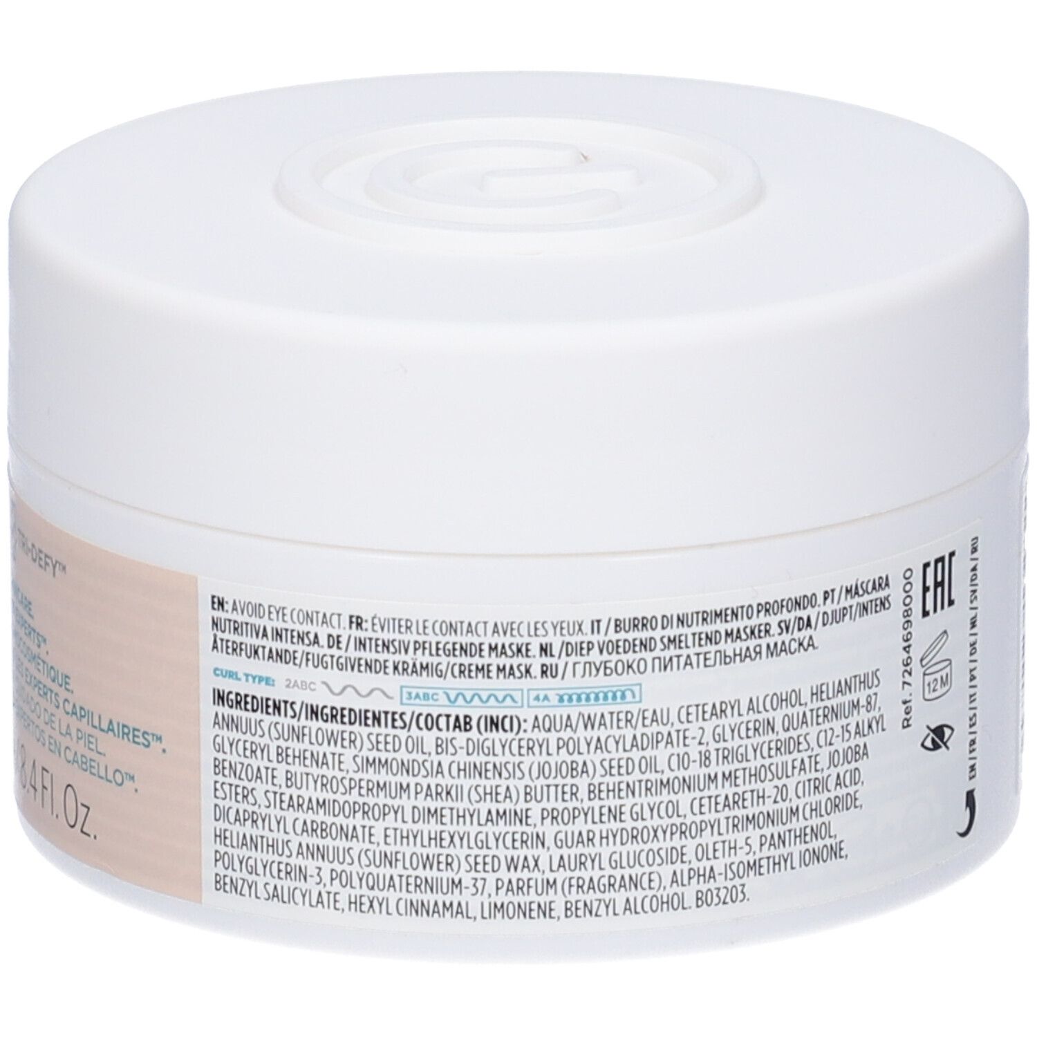 Vasetto bianco di maschera per capelli, con elenco ingredienti e avvertenze.