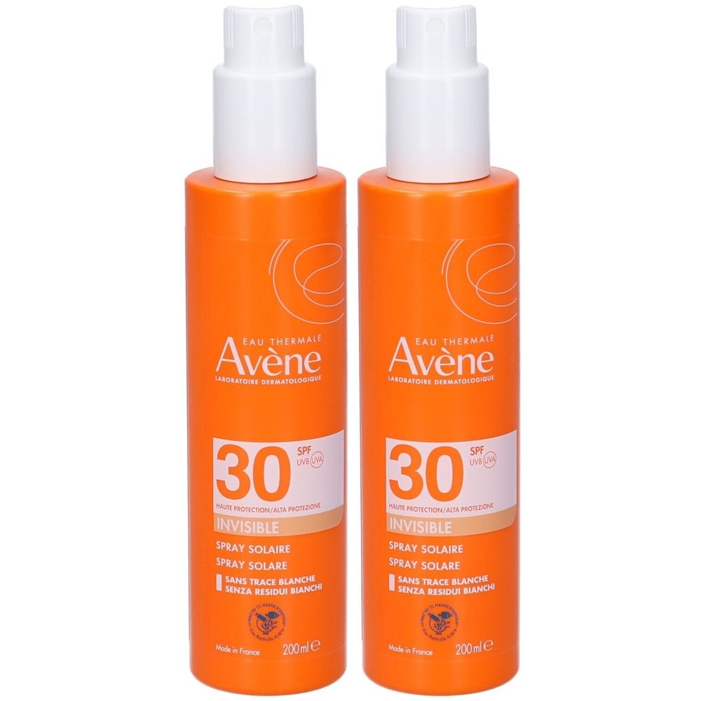 Due flaconi spray arancioni con erogatore bianco. Scritta: Eau Thermale Avène, SPF 30. Testo in francese e italiano.