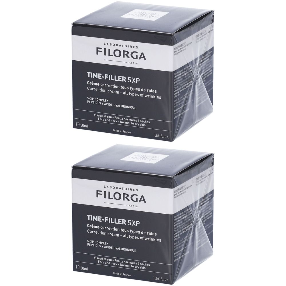 Due scatole quadrate. Scritta: FILORGA TIME-FILLER 5XP. Crema correttiva rughe. Design bianco e nero. 50ml.