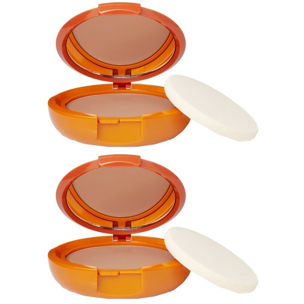 Due compatti cosmetici arancioni con specchi e spugnette. Coperchi aperti mostrano trucco marrone.