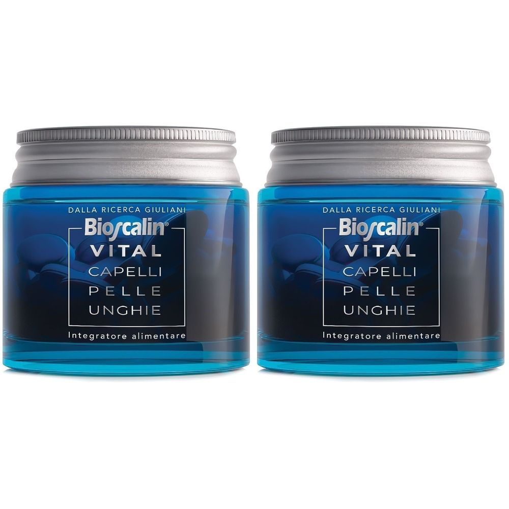 Due barattoli blu con coperchi argentati. Sui barattoli è scritto "Bioscalin VITAL CAPELLI PELLE UNGHIE Integratore alimentare".