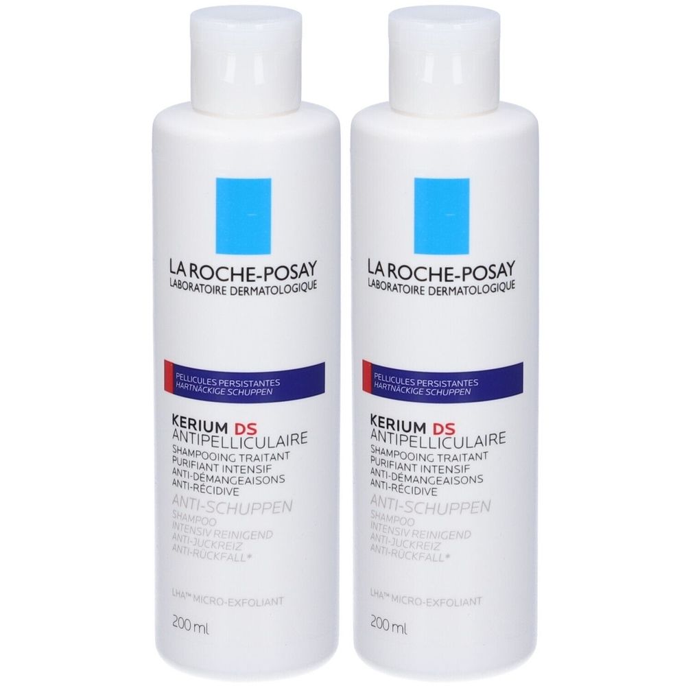 Due flaconi bianchi di shampoo La Roche-Posay Kerium DS antiforfora. Etichette blu e rosse, tappo bianco.