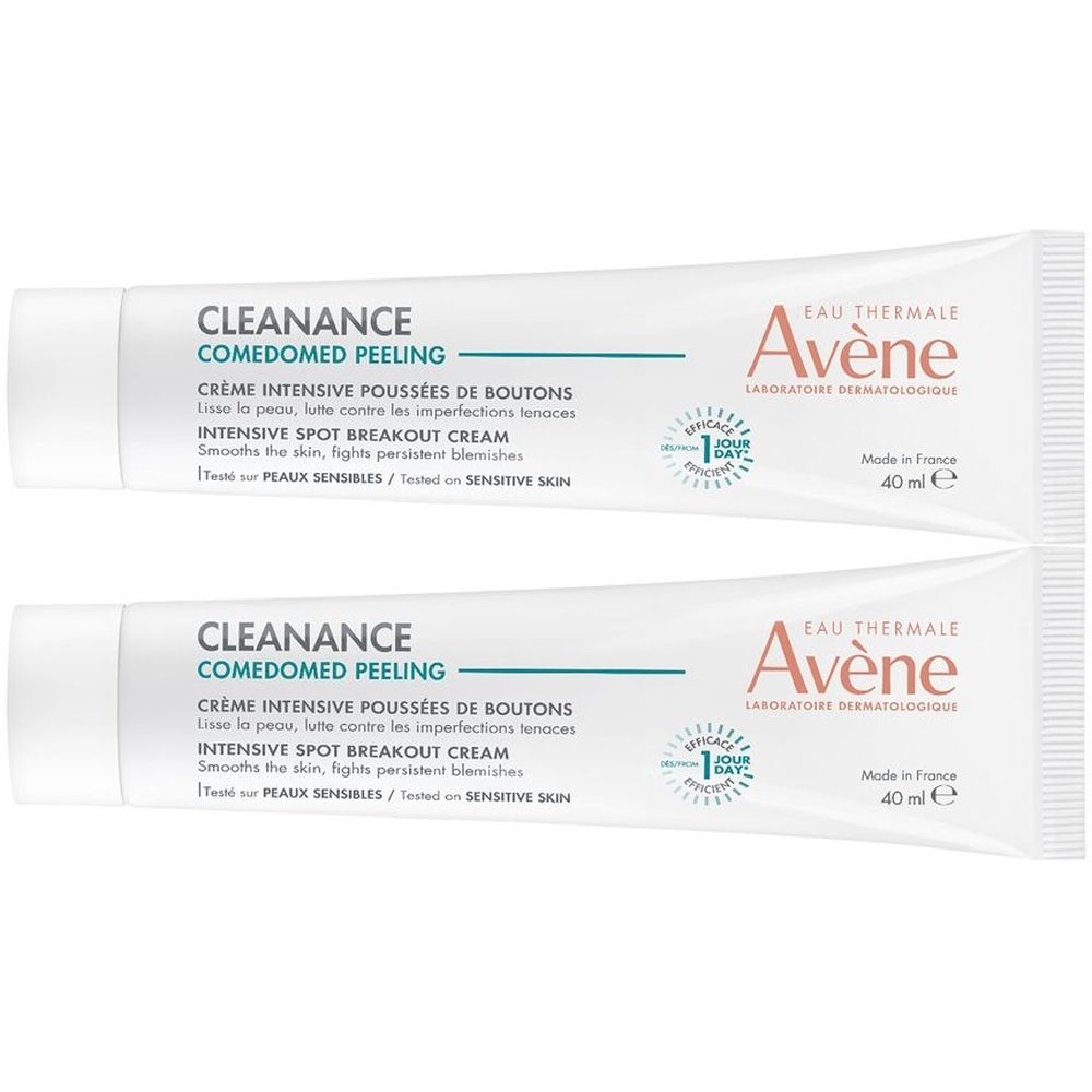 Due tubi di crema. Scritta: CLEANANCE COMEDOMED PEELING, EAU THERMALE Avène. Tubi bianchi con testo blu e rosso. 40 ml.