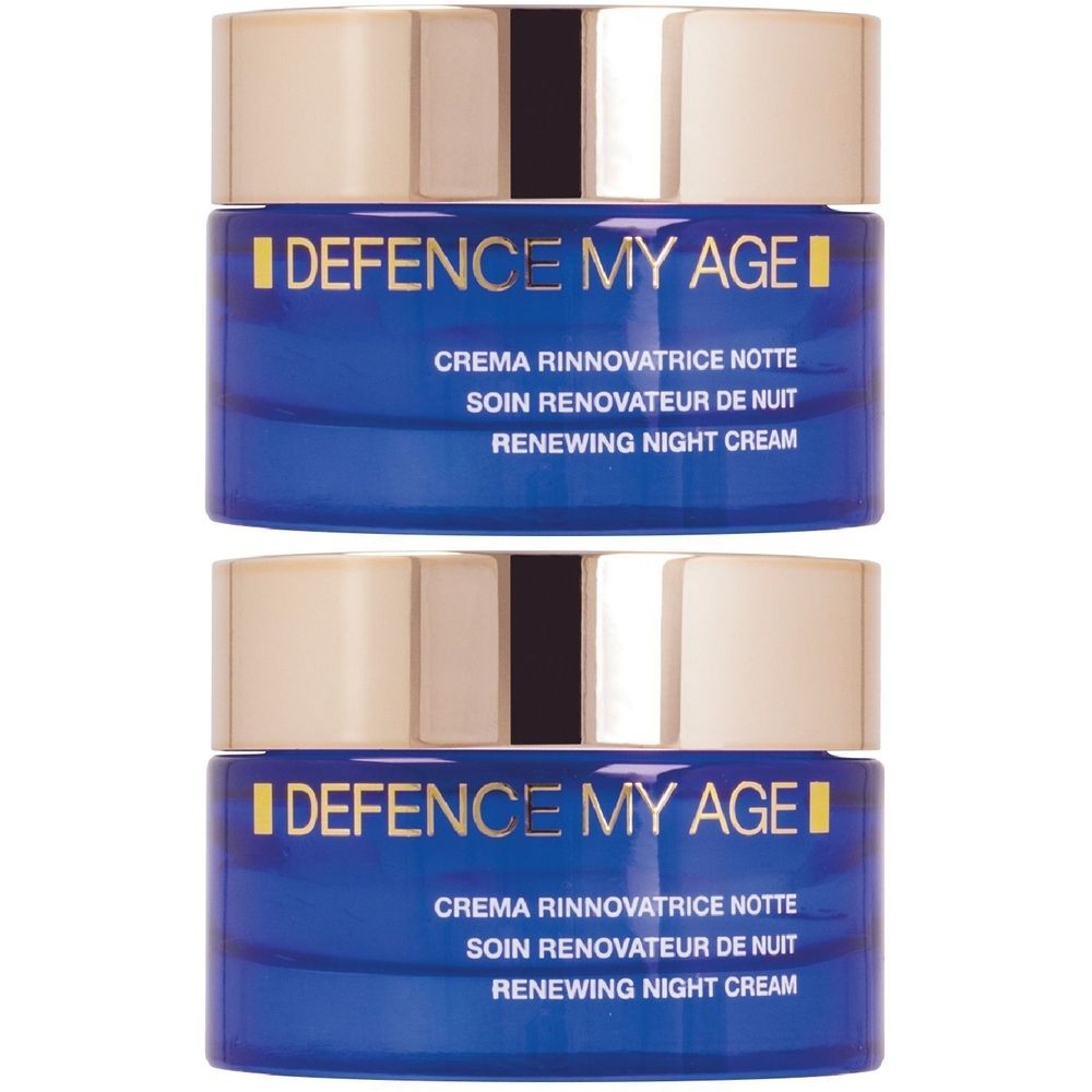 Due vasetti blu con coperchi dorati. Scritta: DEFENCE MY AGE, CREMA RINNOVATRICE NOTTE, RENEWING NIGHT CREAM.