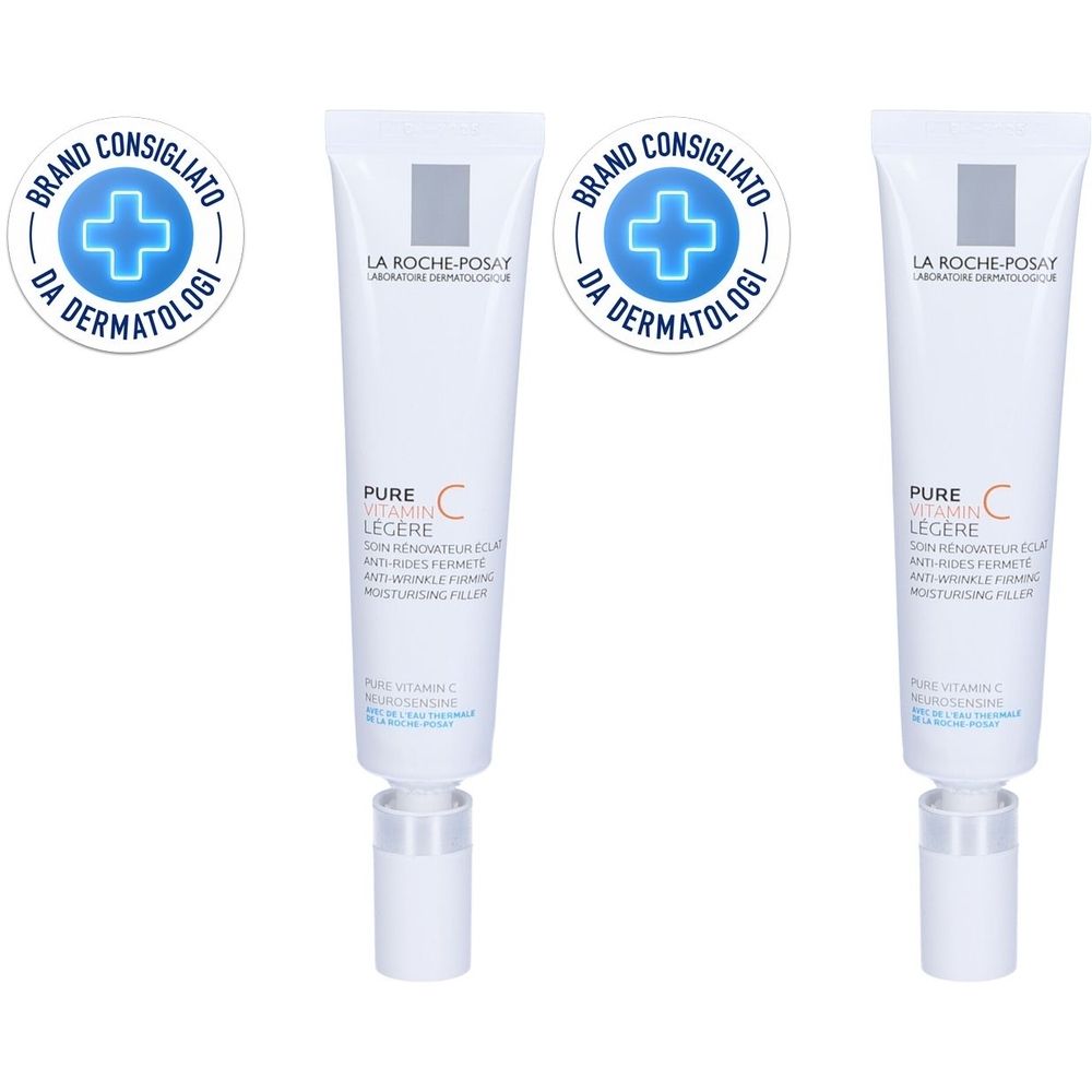 Due tubi bianchi di crema e due sigilli rotondi blu. I tubi riportano "Pure Vitamin C Legere".