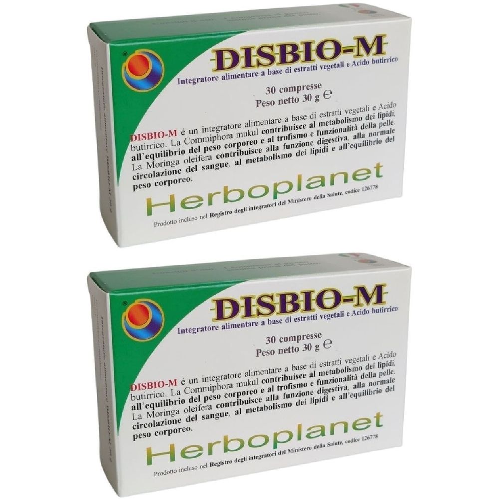 Due scatole di Disbio-M. Scritta: 30 compresse, 30 g. Marchio Herboplanet. Confezione verde e bianca con informazioni.