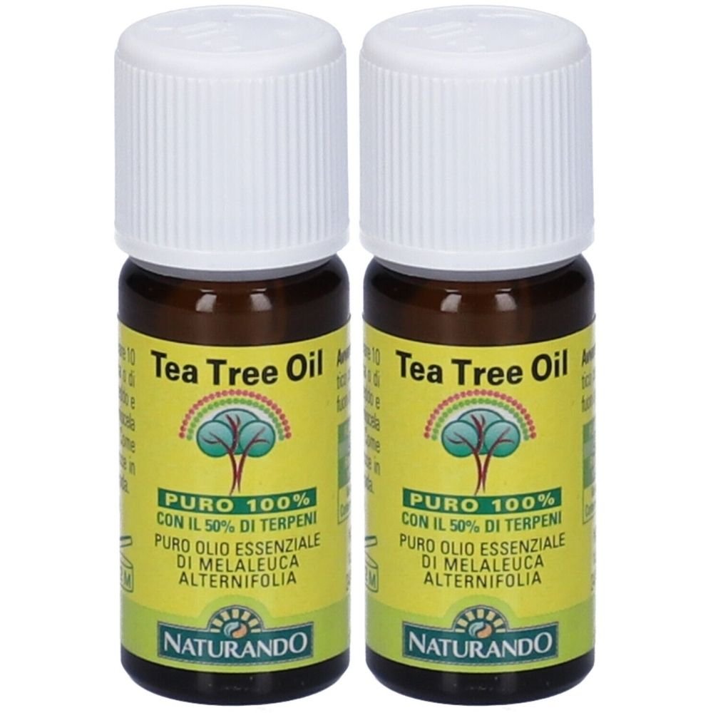 Due piccole bottiglie marroni con tappi bianchi. Etichette con "Tea Tree Oil" e "Naturando".