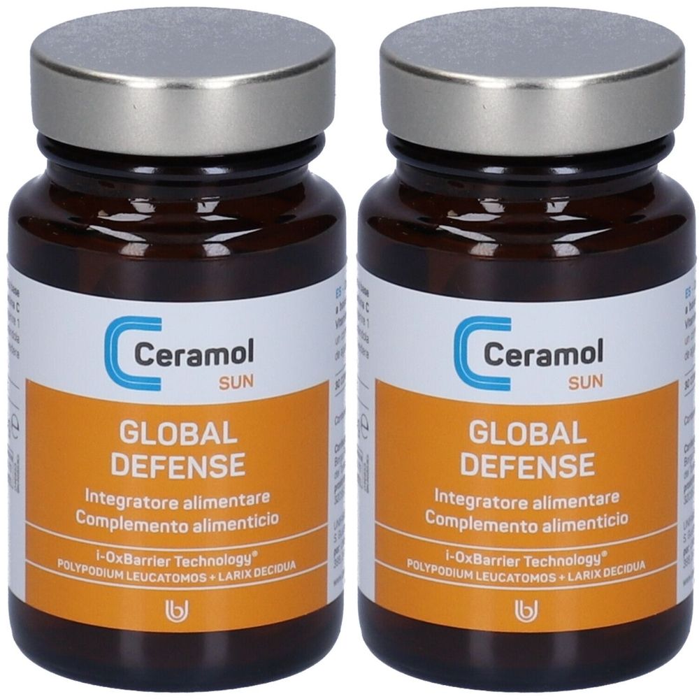 Due flaconi marroni con tappi argentati. Etichette: "Ceramol SUN GLOBAL DEFENSE".