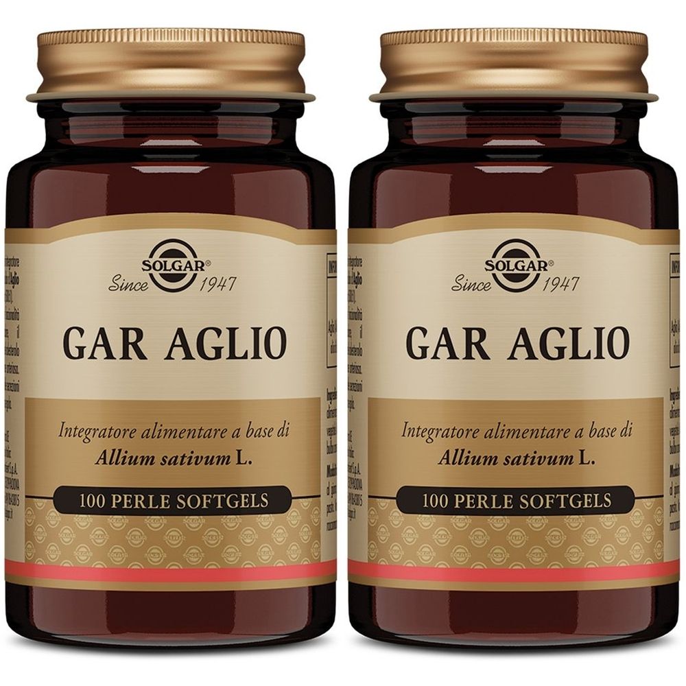 Due bottiglie di vetro marrone con tappi dorati. Scritta: SOLGAR, GAR AGLIO, 100 PERLE SOFTGELS. Integratore alimentare.