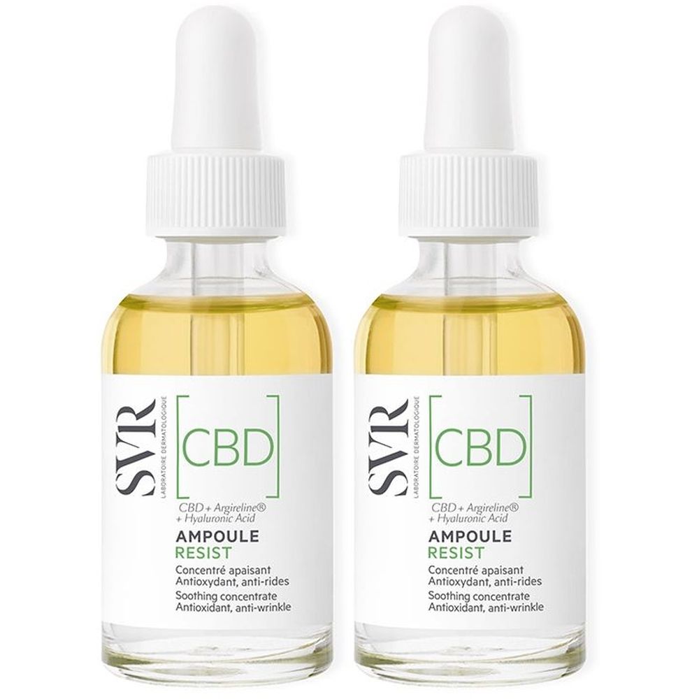 Due flaconi in vetro con contagocce. Etichette: SVR CBD Ampoule Resist. Contiene CBD, acido ialuronico e altri ingredienti.
