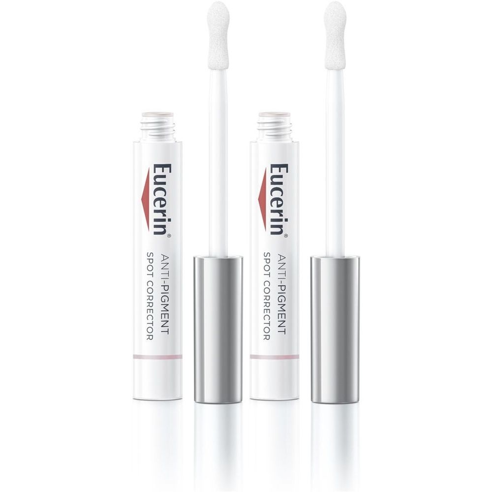 Due tubi di Eucerin Anti-Pigment Spot Corrector con applicatori. Flaconi bianchi con tappi argentati e nome del prodotto.