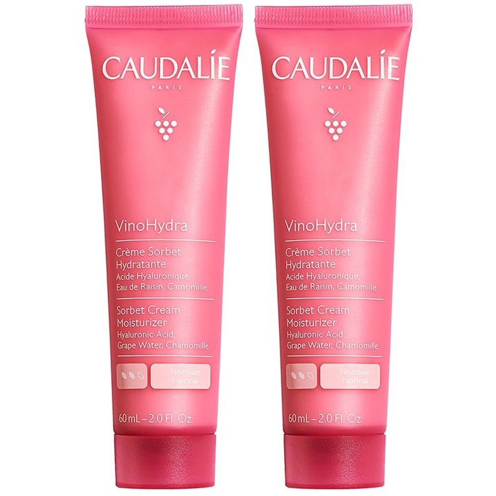 Due tubi rosa con testo bianco. Scritta: Caudalie, VinoHydra, Crème Sorbet Hydratante, 60ml.