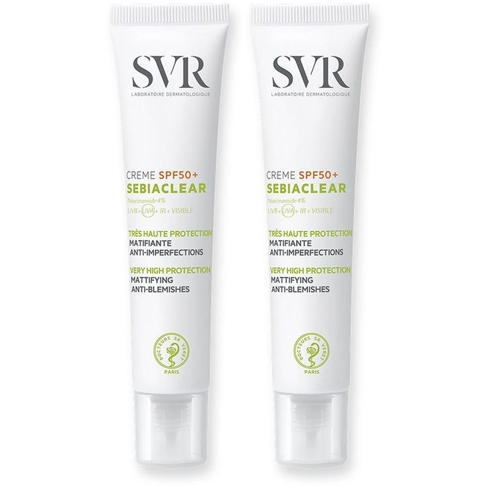 Due tubi di crema SVR SEBIACLEAR SPF50+. Tubi bianchi con scritte verdi e nere. Protezione molto alta, anti-imperfezioni.