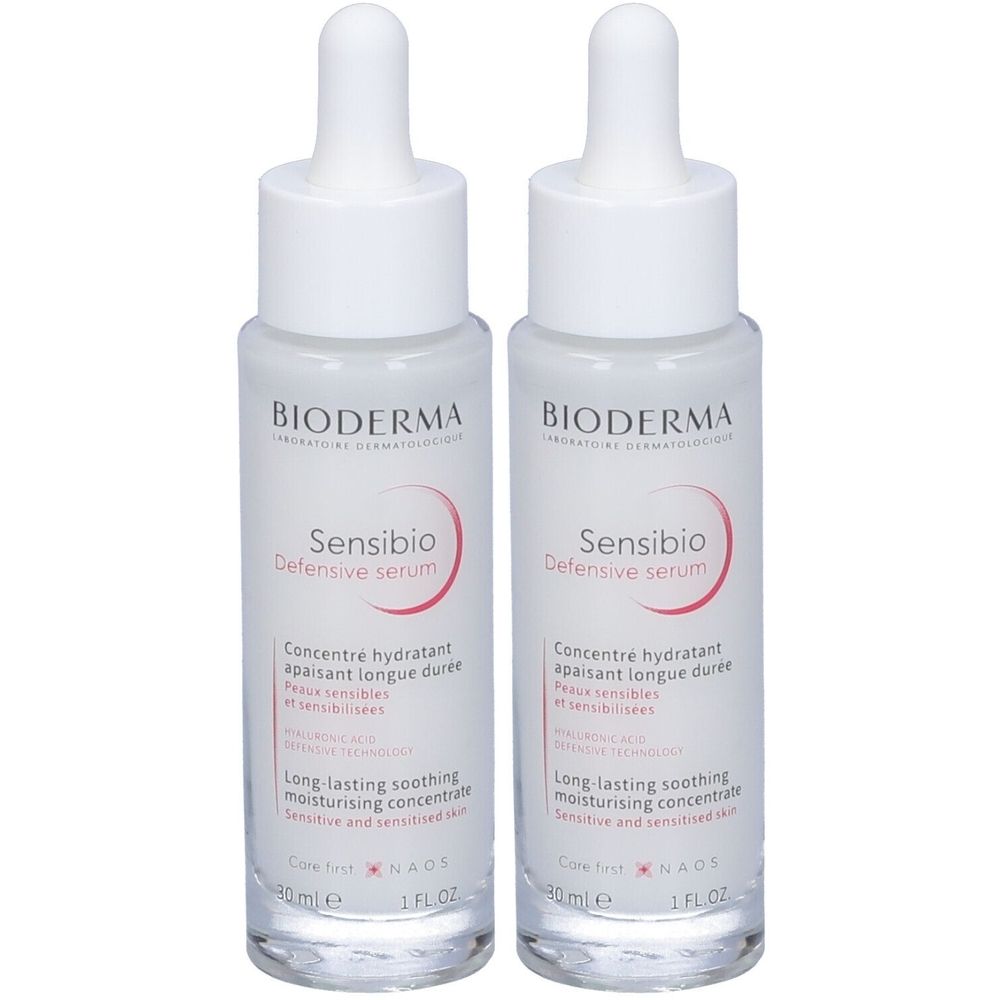 Due flaconi di siero con tappi bianchi ed etichette. Scritta: BIODERMA, Sensibio Defensive serum. Testi in francese e inglese.