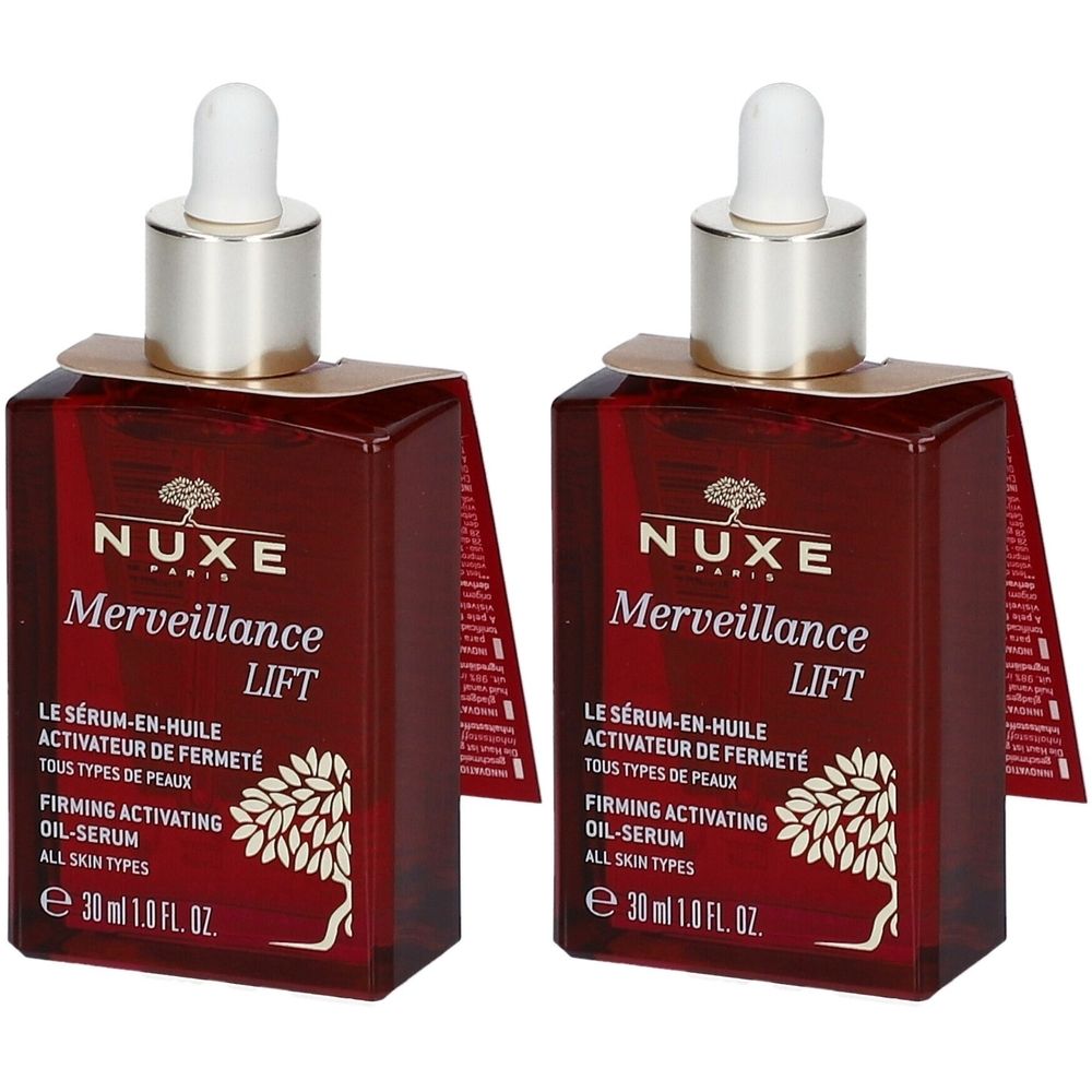 Due flaconi di siero Nuxe Merveillance Lift. Flaconi quadrati in vetro rosso con tappo argentato e pipetta. Scritta: Nuxe, Merveillance Lift.