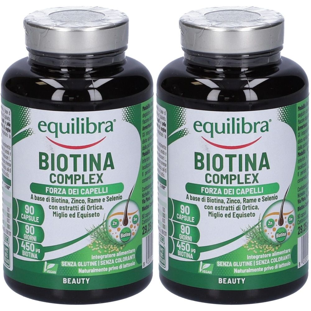 Due flaconi Equilibra Biotina Complex. Scritta: FORZA DEI CAPELLI. Contiene 90 capsule. Confezione verde e nera.